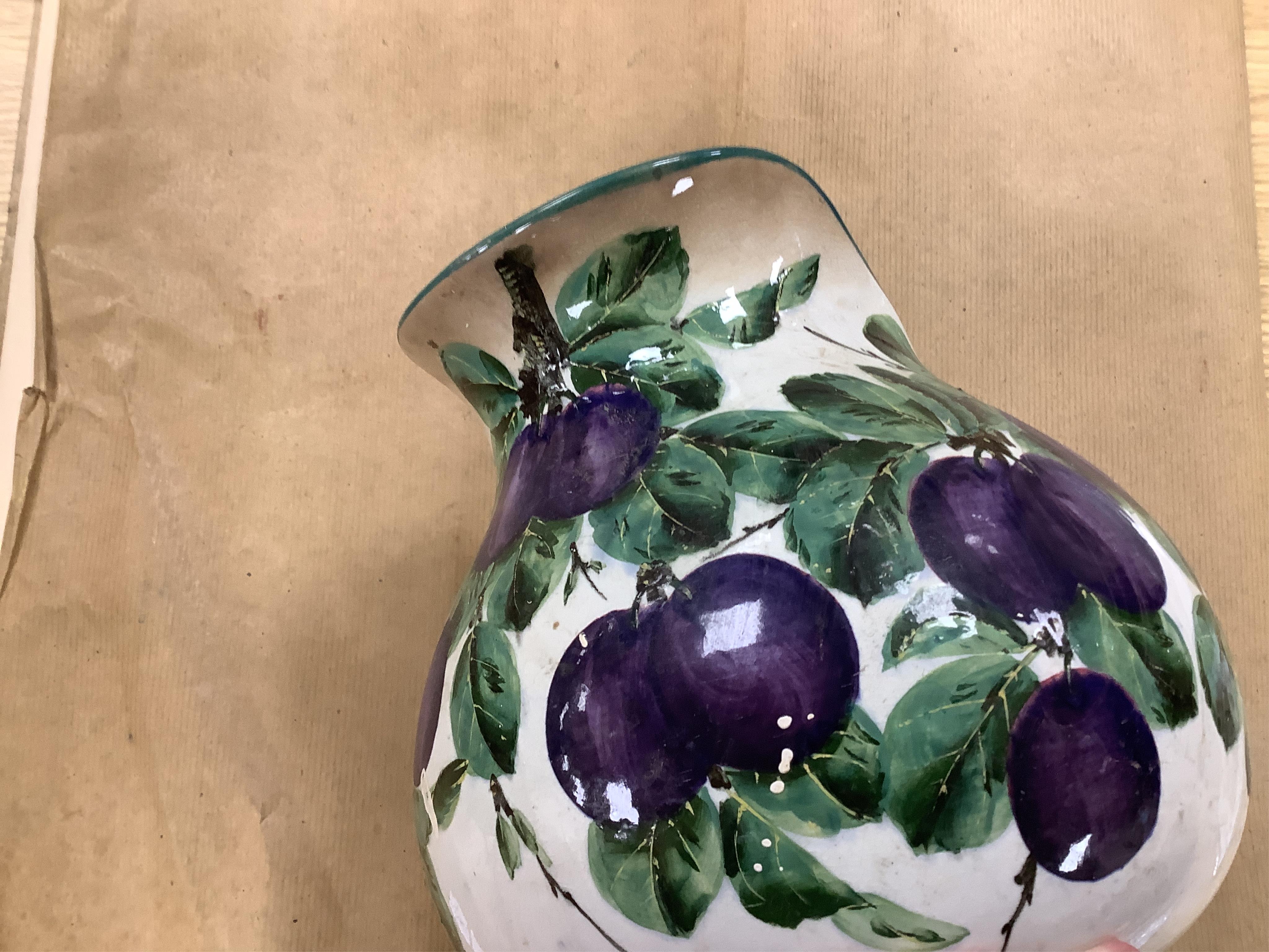 A Wemyss four-piece toilet set, a jug and basin, soap dish with liner, and bowl, damson pattern. Basin 39cm diameter., Condition - poor